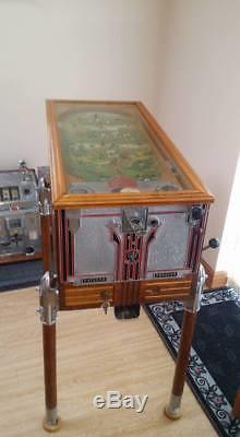 5 cent US 1934 Jennings sportsman payout pinball. A Bandit in disguise