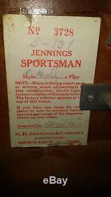 5 cent US 1934 Jennings sportsman payout pinball. A Bandit in disguise