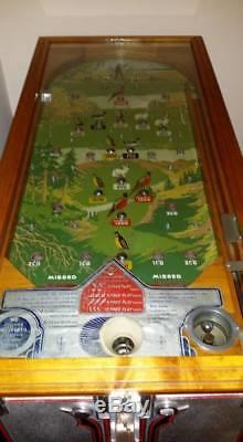 5 cent US 1934 Jennings sportsman payout pinball. A Bandit in disguise