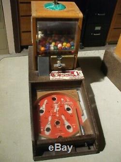 Original 1940's Victor penguin football pinball penny gumball vending machine
