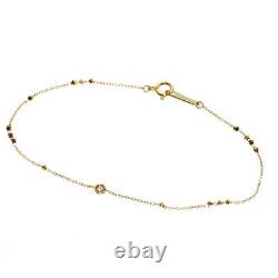Bracelet VANDOME avec globe à neige en diamant et épinglette en or jaune K18