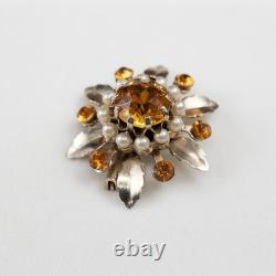 Broche en or en forme de fleur avec pierre orange portée par Lucille Ball, Sydney Guilaroff.