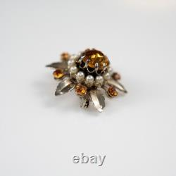 Broche en or en forme de fleur avec pierre orange portée par Lucille Ball, Sydney Guilaroff.