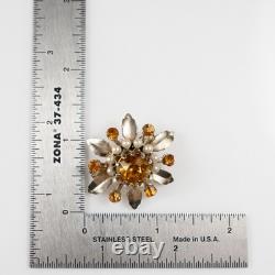 Broche en or en forme de fleur avec pierre orange portée par Lucille Ball, Sydney Guilaroff.