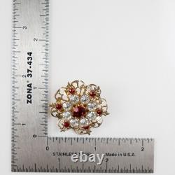 Broche en or en forme de fleur avec pierre orange portée par Lucille Ball, Sydney Guilaroff.