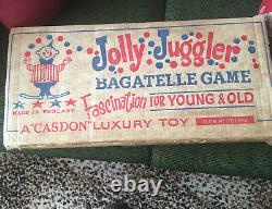 Machine à boule de flipper portative légère Casdon Jolly Juggler dans sa boîte vintage